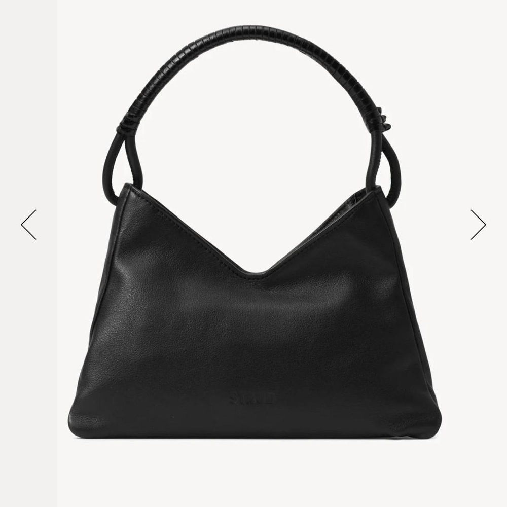 Staud Valerie Shoulder Bag  $350
Very slight peeling of leather in the corner